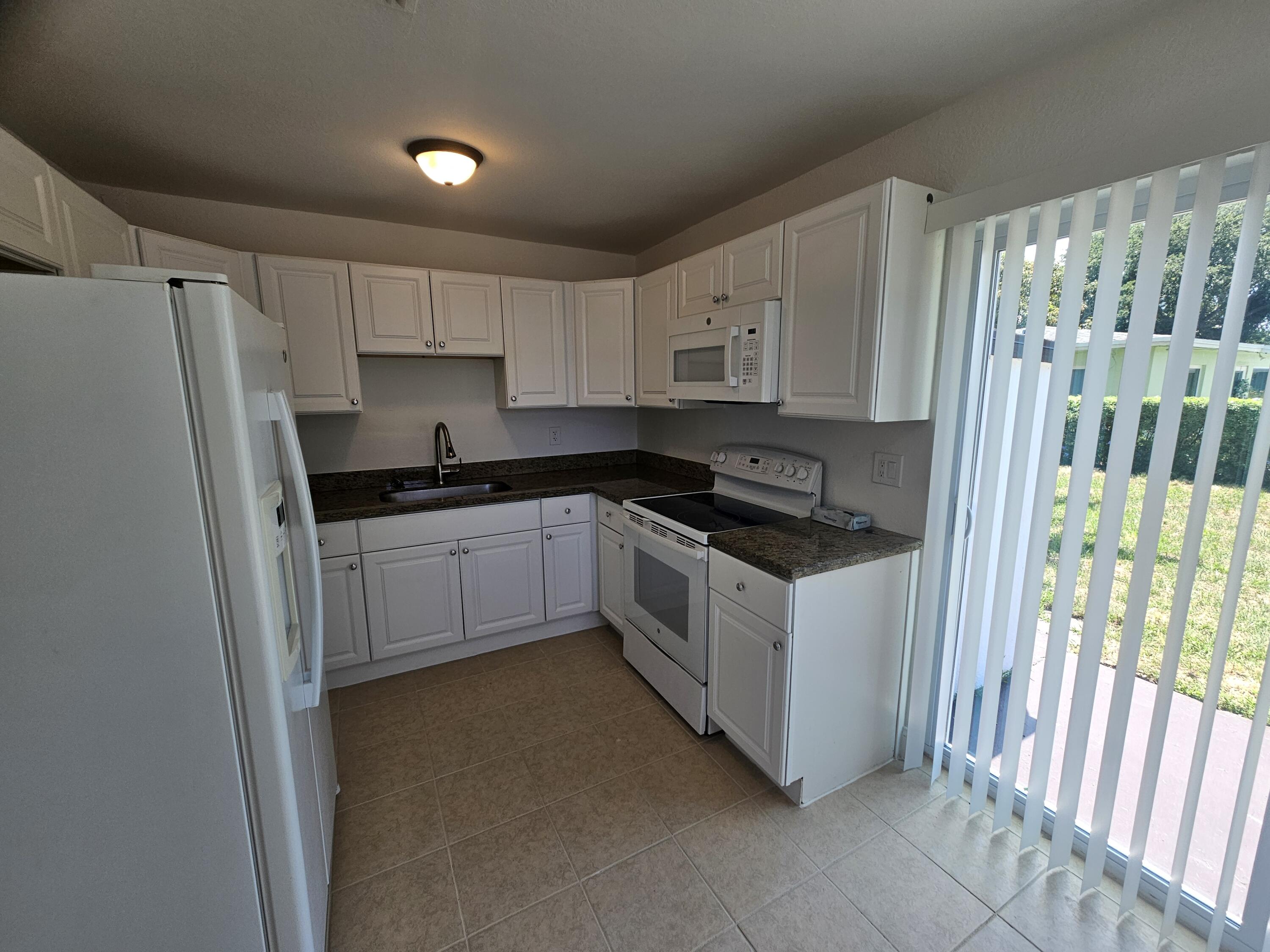 1605 West 10th Street Riviera Beach, FL 33404 - Photo 27 of 52 20260509_141124