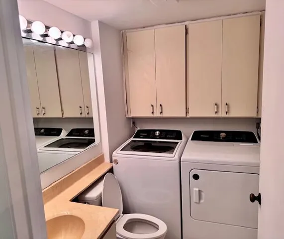 a utility room with dryer and washer