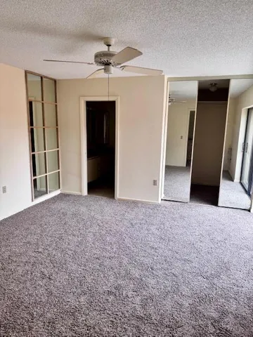 a view of a livingroom with a staircase