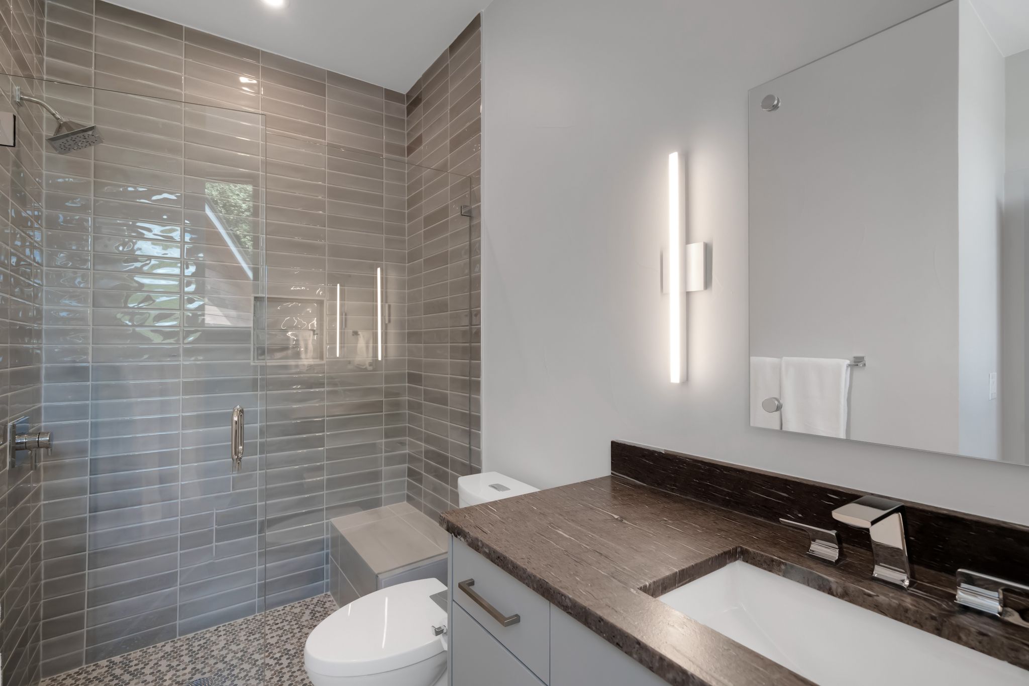 809 Bouldin Avenue Austin, TX 78704 - Photo 19 of 39 Bathroom with vanity and a shower stall
