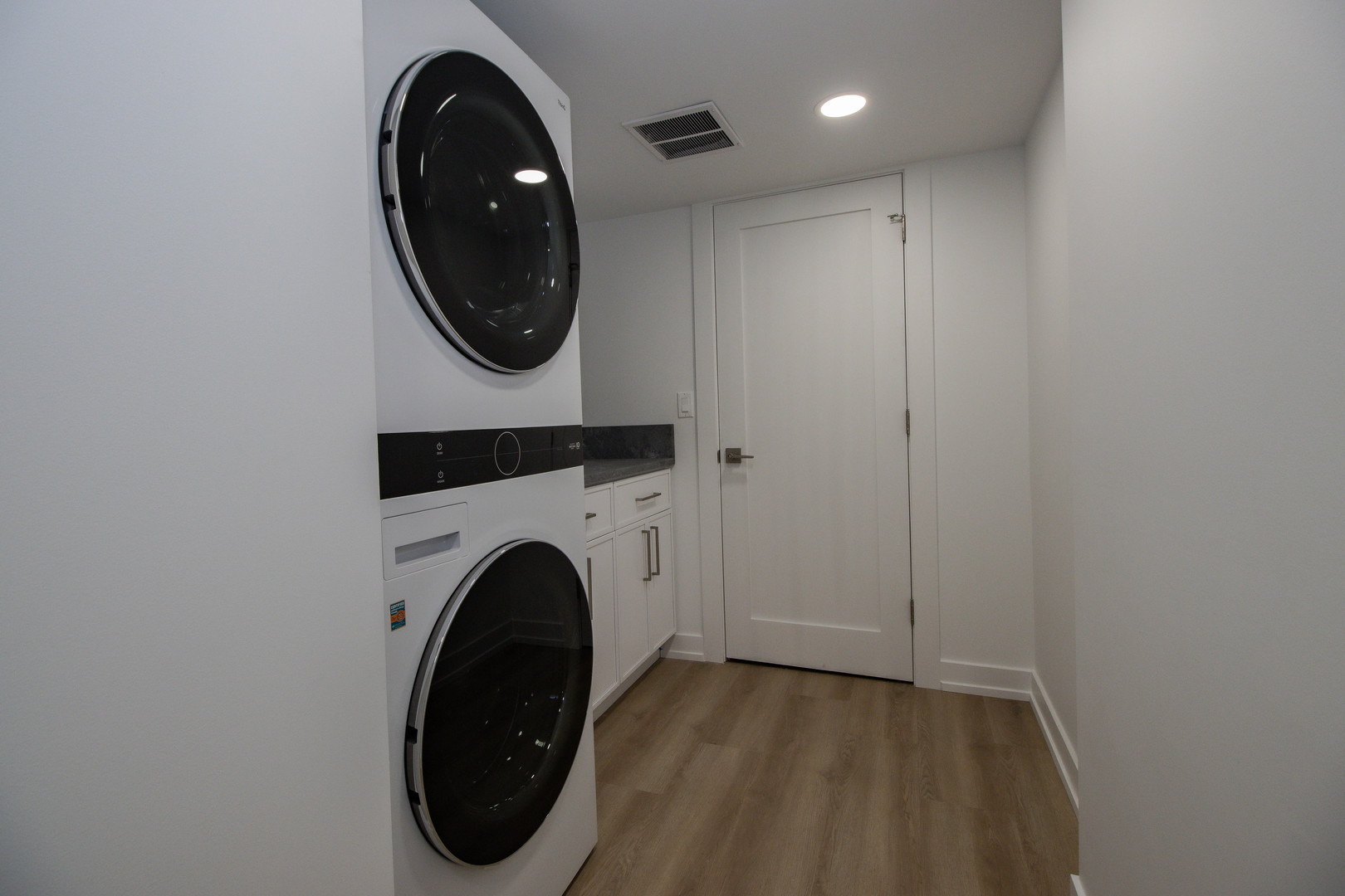 1139 North Winchester Avenue, Unit G Chicago, IL 60622 - Photo 18 of 22 a close view of a utility room with dryer and washer