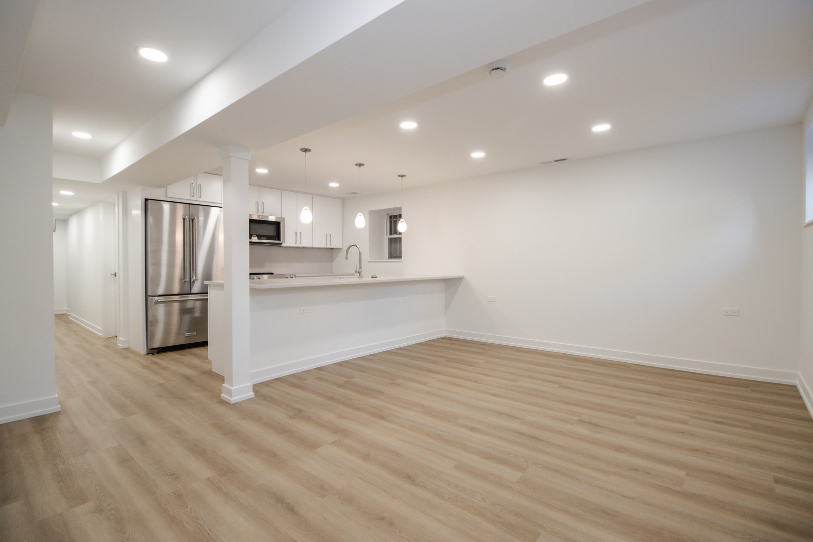 1139 North Winchester Avenue, Unit G Chicago, IL 60622 - Photo 2 of 22 a view of kitchen with refrigerator and window