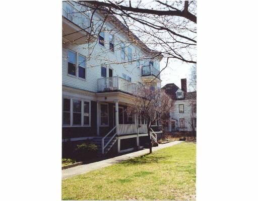 30 Stanton Road, Unit 6 30 Brookline, MA 02445 - Photo 1 of 1 a view of a house with a yard