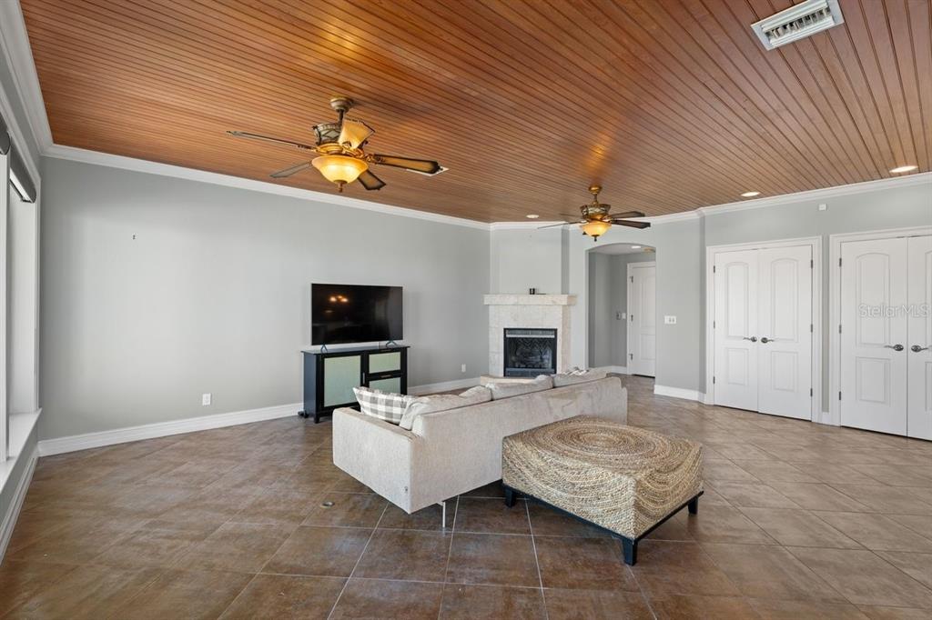 2 Mar Azul North Ponce Inlet, FL 32127 - Photo 19 of 98 a living room with furniture and a flat screen tv