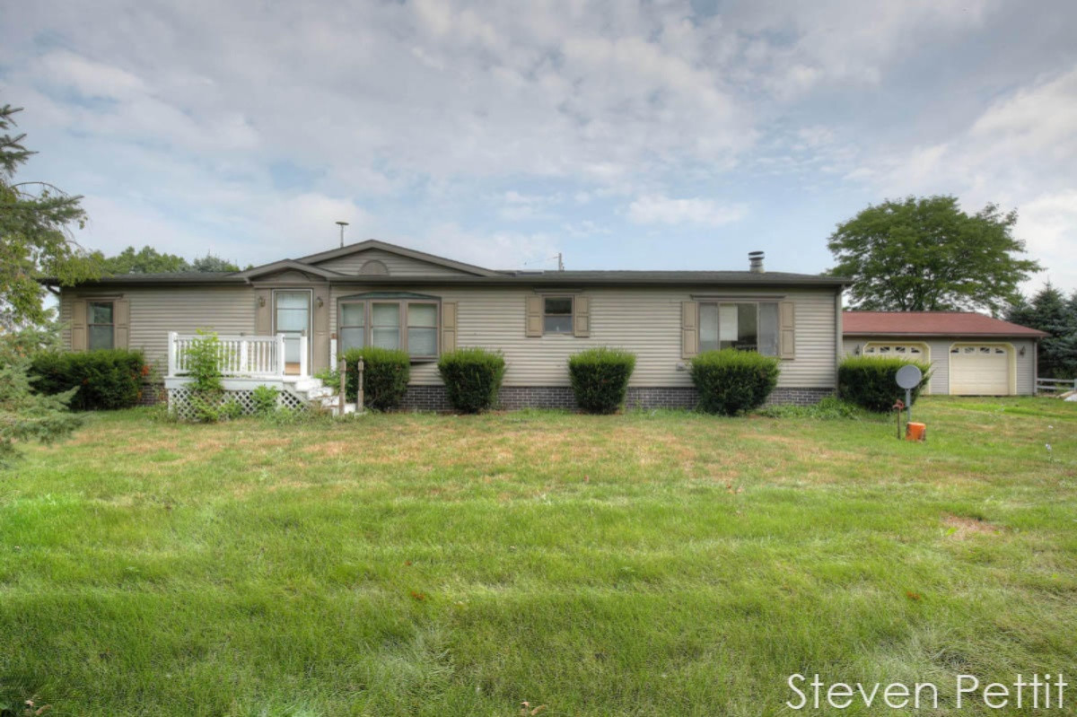 6259 Borden Road Fenwick, MI 48834 - Photo 1 of 29 490A8452