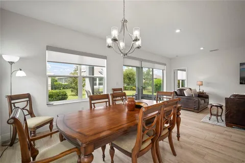 a view of walk in closet with clothes