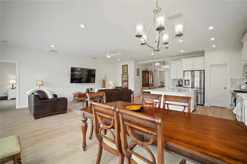 a bedroom with a bed and a lamp