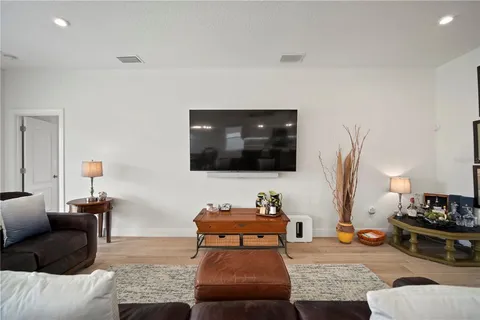 a bed room with a bed and a lamp