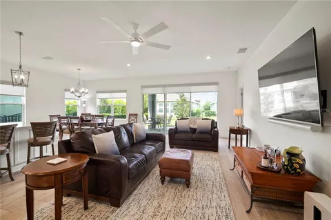 a view of a porch with a table chairs and garden