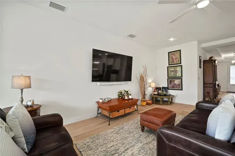 a view of house with backyard porch and garden