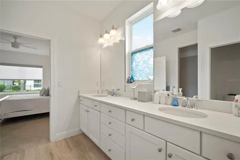 a view of a porch with furniture and garden