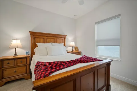 a view of a swimming pool with outdoor seating