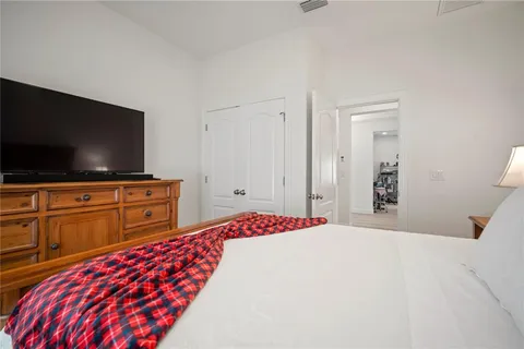 a view of swimming pool with a table and chairs
