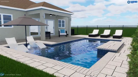 an aerial view of a house with a garden