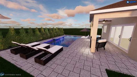 a view of a workspace with furniture and a chandelier