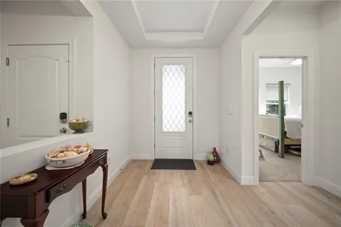a kitchen with sink a stove and cabinets