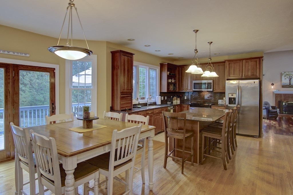 21 Falcon Ridge Drive Hopkinton, MA 01748 - Photo 4 of 30 a view of a a dining room with furniture window and wooden floor
