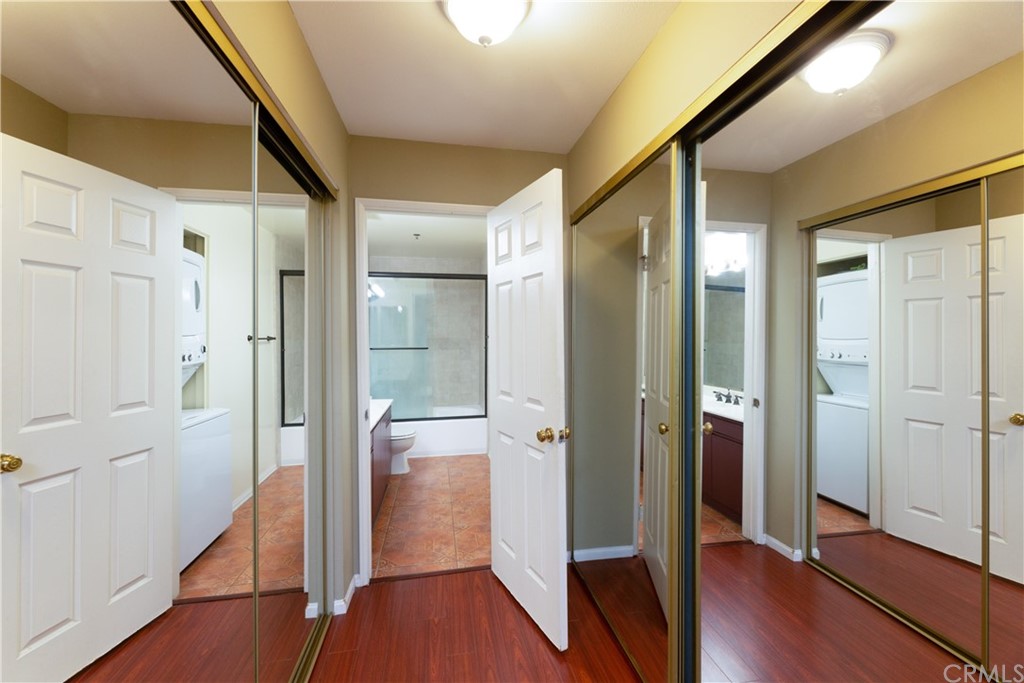 801 Pine Avenue, Unit 301 Long Beach, CA 90813 - Photo 13 of 18 a view of a hallway with wooden floor