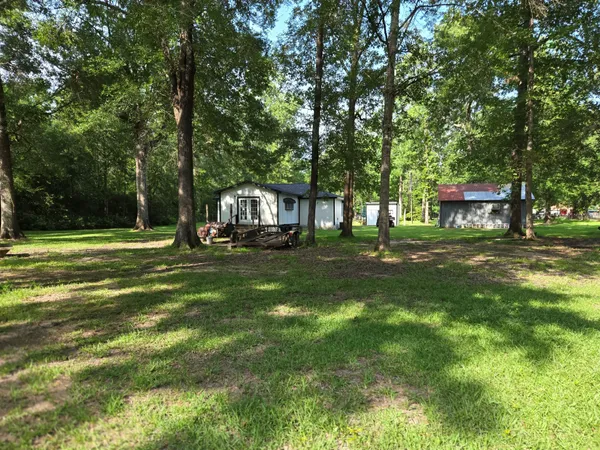 $260,000 | 1123 County Road 2254, Cleveland, TX 77327