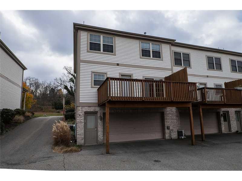 2426-unit E Rochester Road Franklin Park, PA 15143 - Photo 23 of 24 Exterior Back. Rear view of home with deck, 2 car garage and separate man-door!