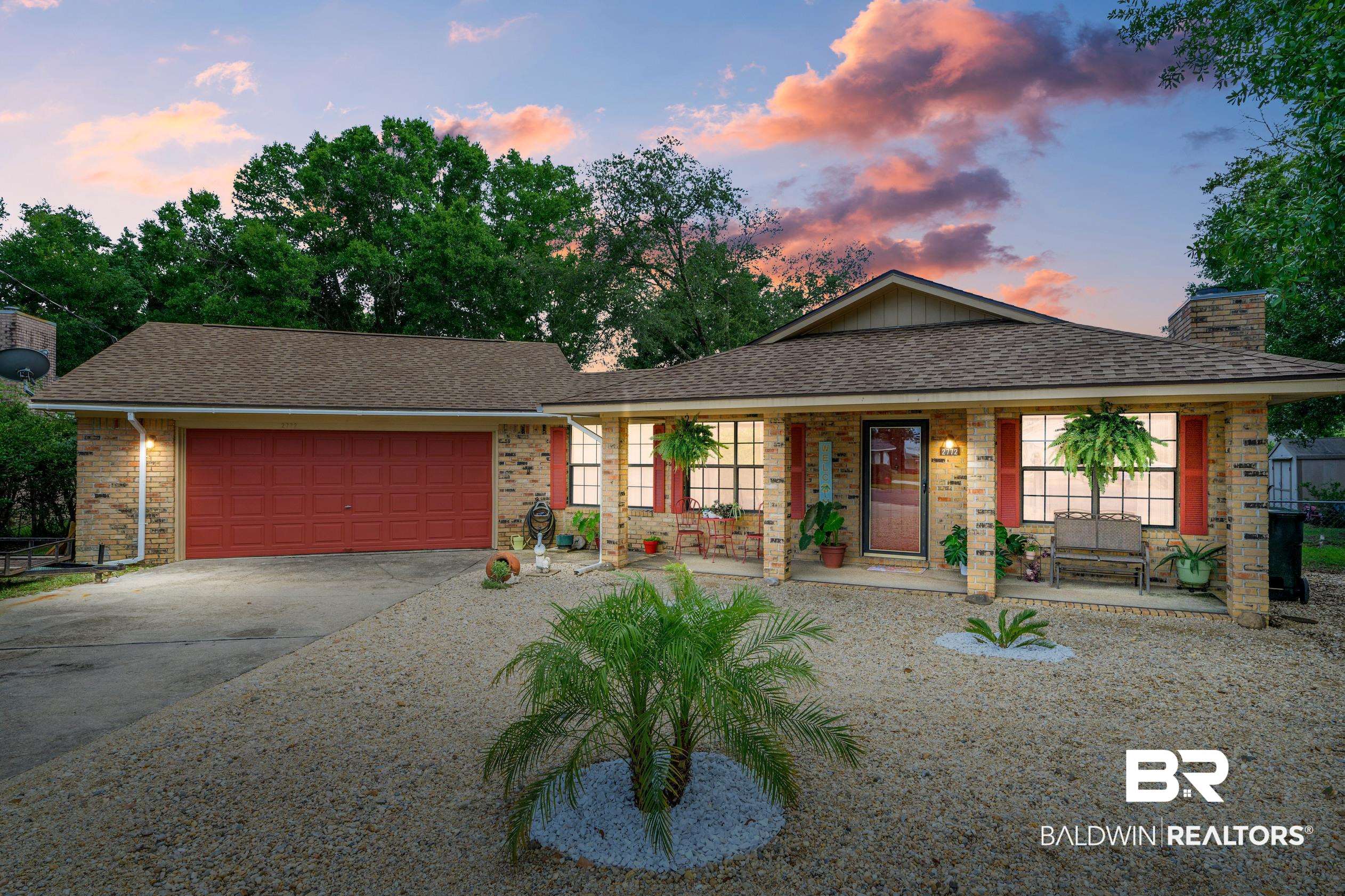 2772 Santa Rosa Circle Lillian, AL 36549 - Photo 1 of 50 Ranch-style home with a garage