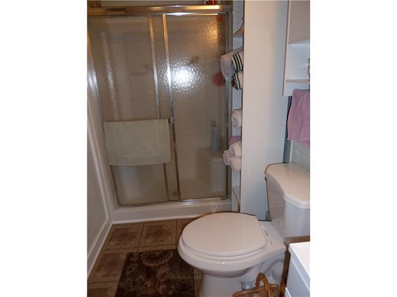 1138 Thomas Eighty Four Road Eighty Four, PA 15330 - Photo 24 of 25 Full Bath. Full bath with walk-in shower on the lower level off the gameroom includes new vanity/sink & cabinets & commode.