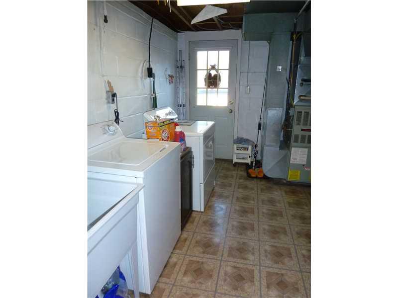 1138 Thomas Eighty Four Road Eighty Four, PA 15330 - Photo 25 of 25 Other. 11x11 Laundry room with newer vinyl flooring and walk-out rear door.