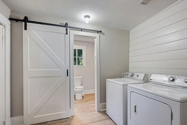 a utility room with dryer and washer