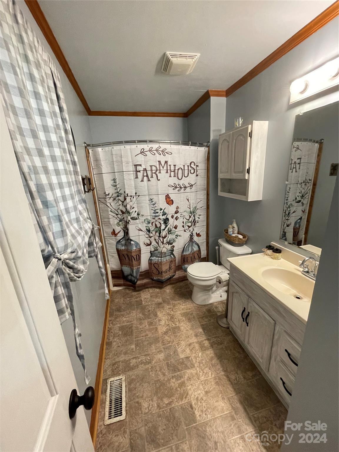3063 Rocky Road Lenoir, NC 28645 - Photo 10 of 11 a bathroom with a sink toilet and shower