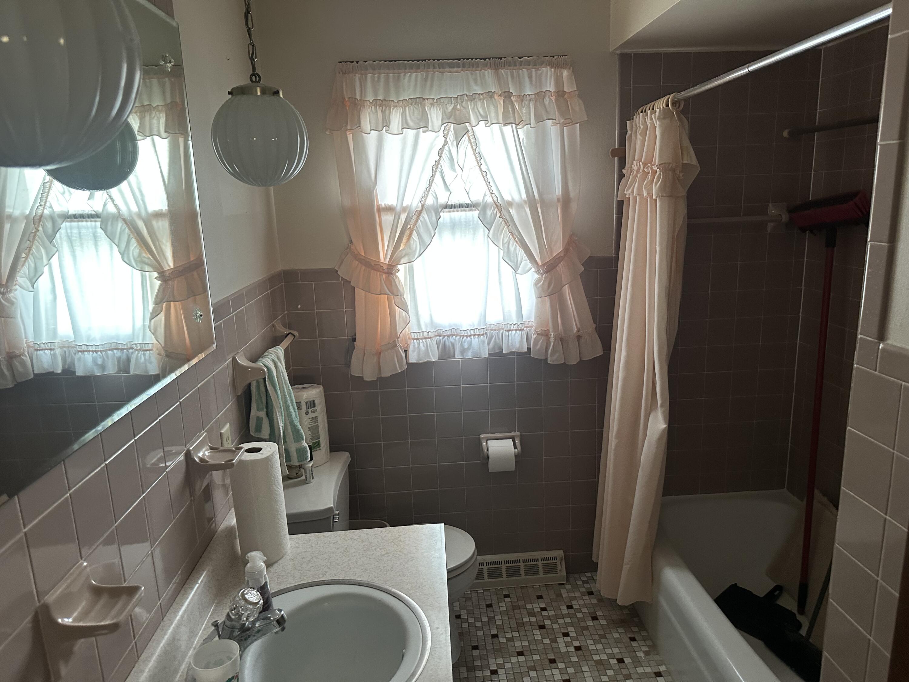 240 Rush Court Hobart, IN 46342 - Photo 7 of 19 a bathroom with a sink and a mirror