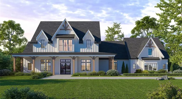 front view of a house with a yard