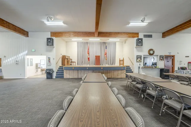 a large kitchen with stainless steel appliances lots of counter space and a sink