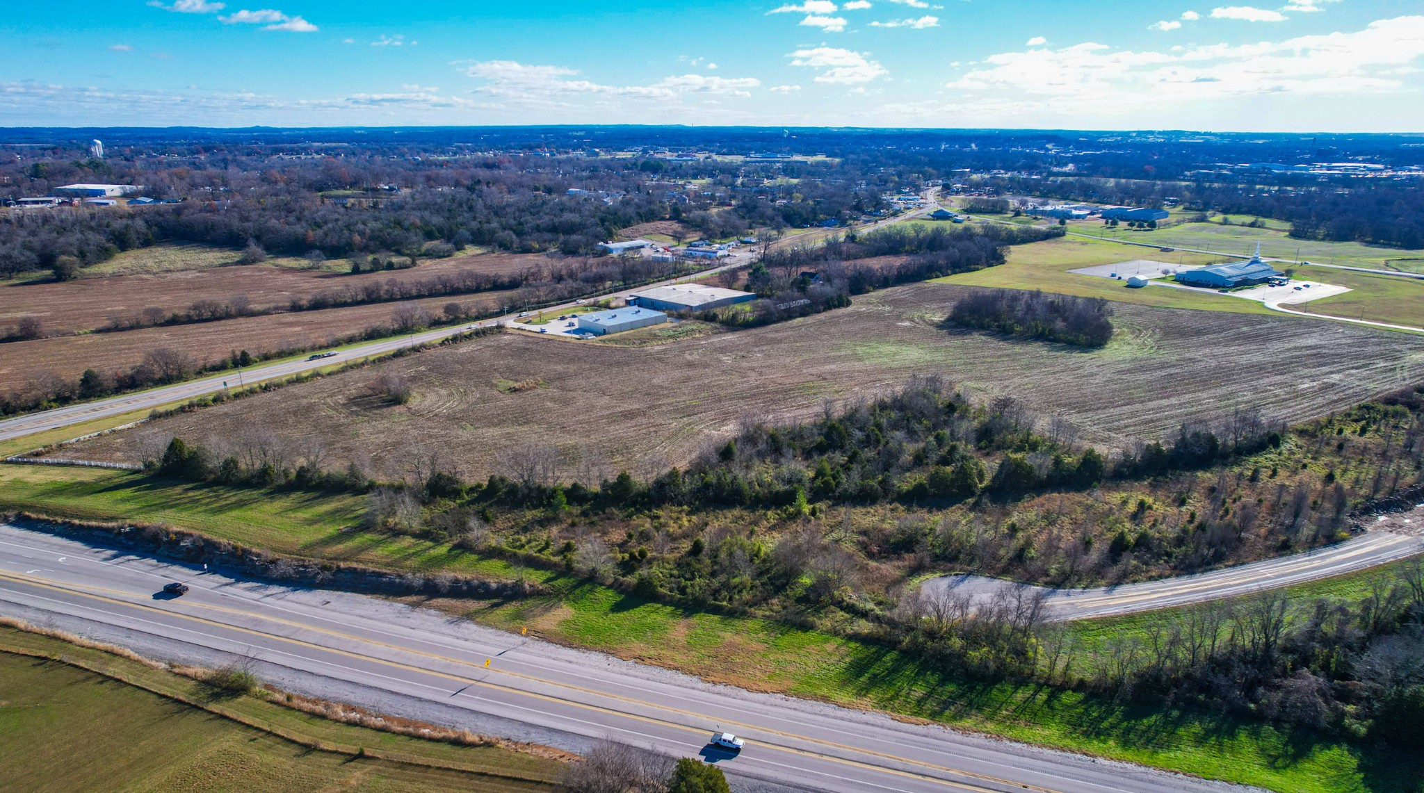 0 Cadiz Road Hopkinsville, KY 42240 - Photo 23 of 56 a view of a backyard of the house
