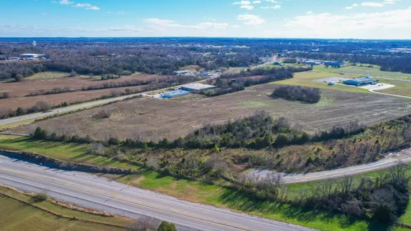 a view of a swimming pool and an outdoor space