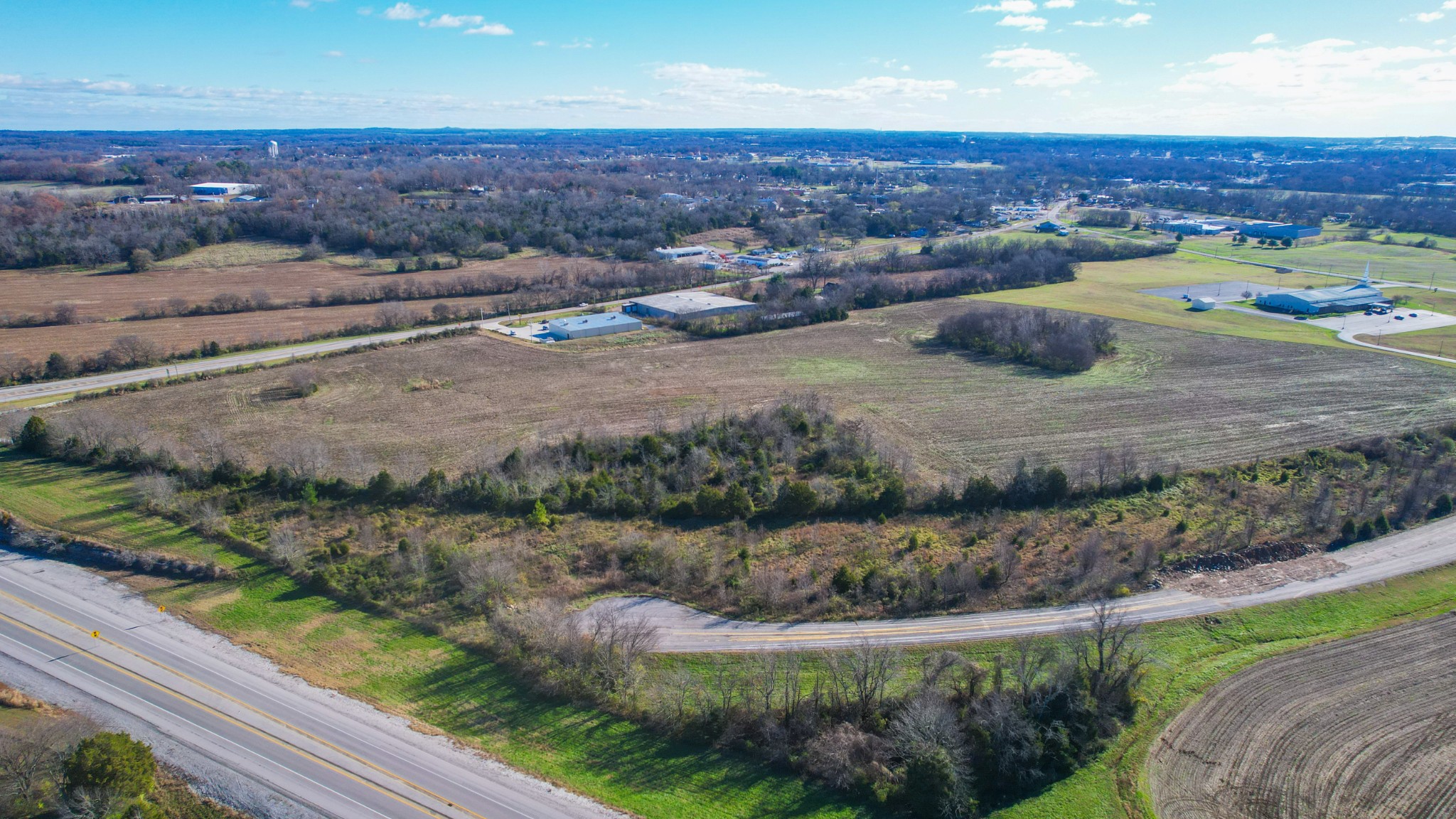 0 Cadiz Road Hopkinsville, KY 42240 - Photo 25 of 56 a view of a city street with a yard