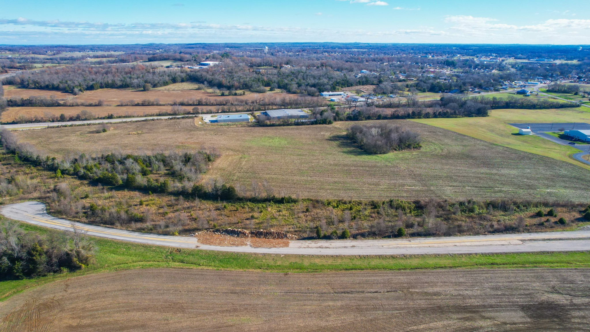 0 Cadiz Road Hopkinsville, KY 42240 - Photo 26 of 56 a view of a lake with a mountain in the background