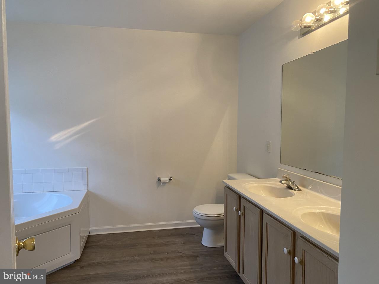 30 White Birch Boulevard Bear, DE 19701 - Photo 15 of 24 a bathroom with a sink and a mirror