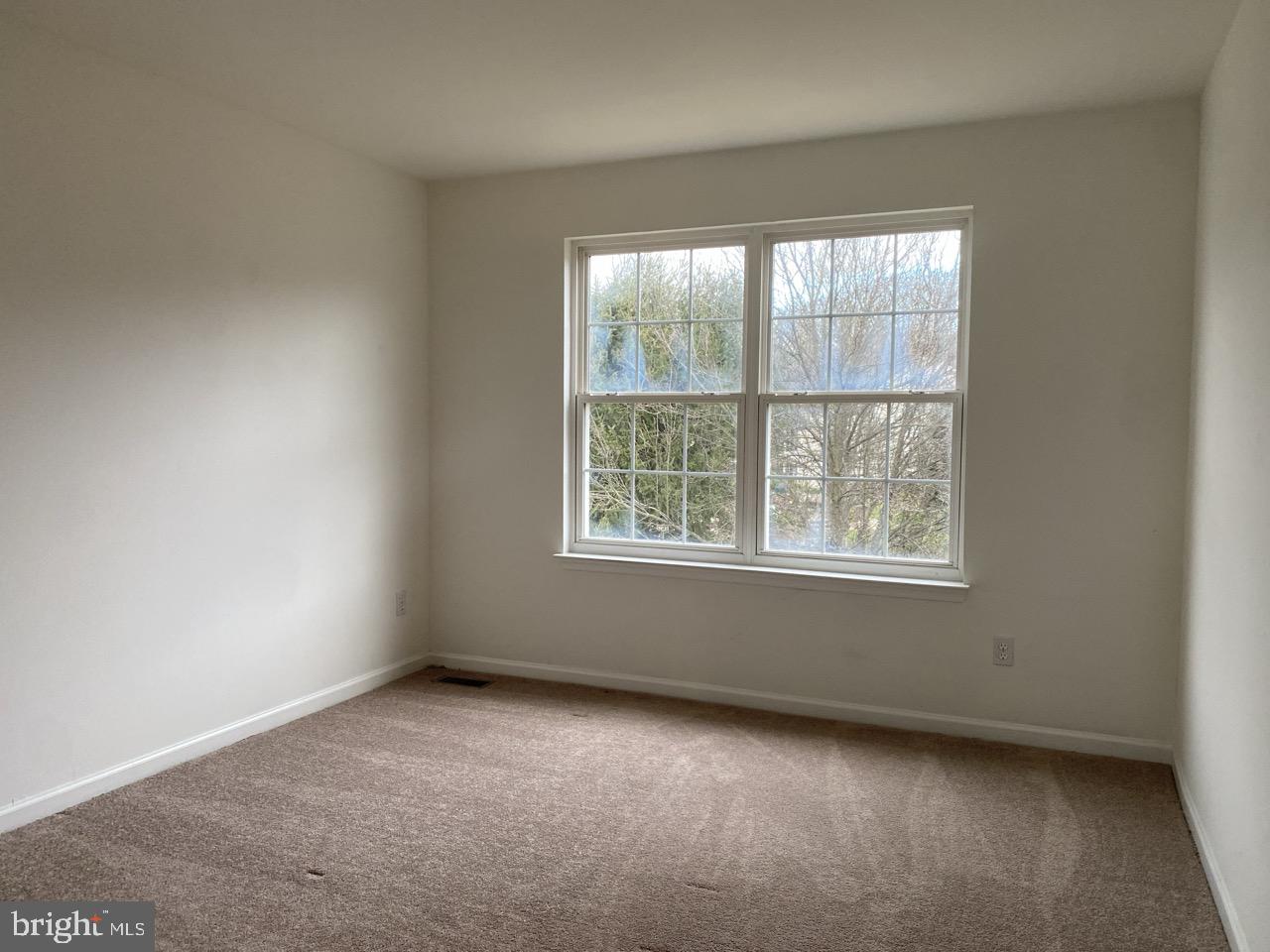 30 White Birch Boulevard Bear, DE 19701 - Photo 17 of 24 an empty room with a window