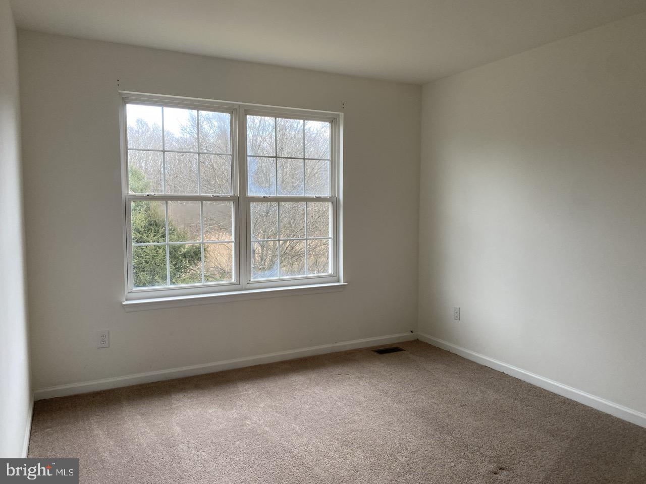 30 White Birch Boulevard Bear, DE 19701 - Photo 19 of 24 an empty room with a window