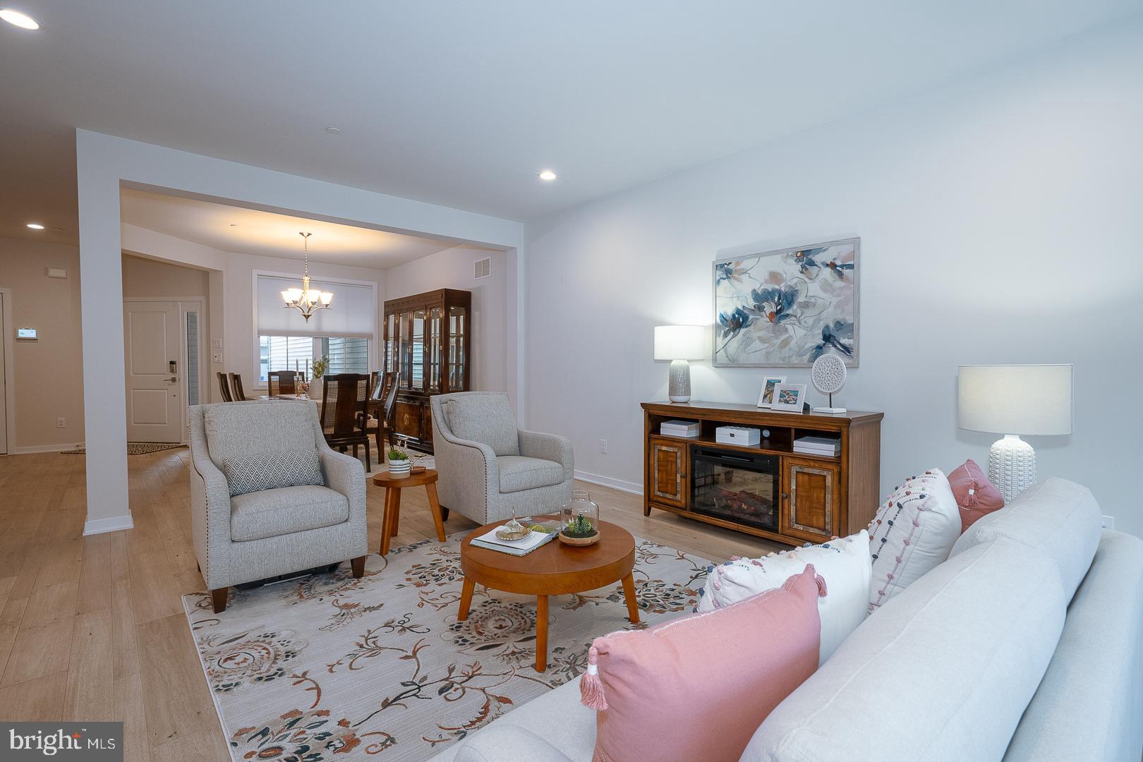 724 Switchman Road Media, PA 19063 - Photo 11 of 70 a living room with furniture and a wooden floor