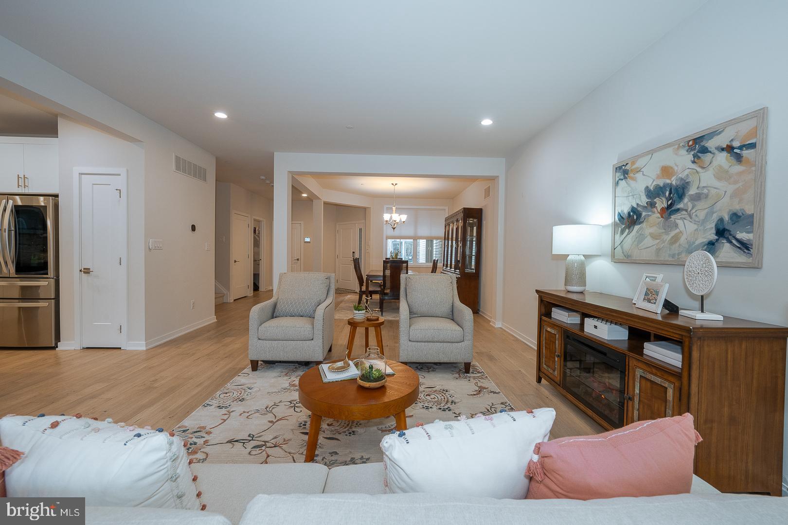 724 Switchman Road Media, PA 19063 - Photo 12 of 70 a living room with furniture and a flat screen tv