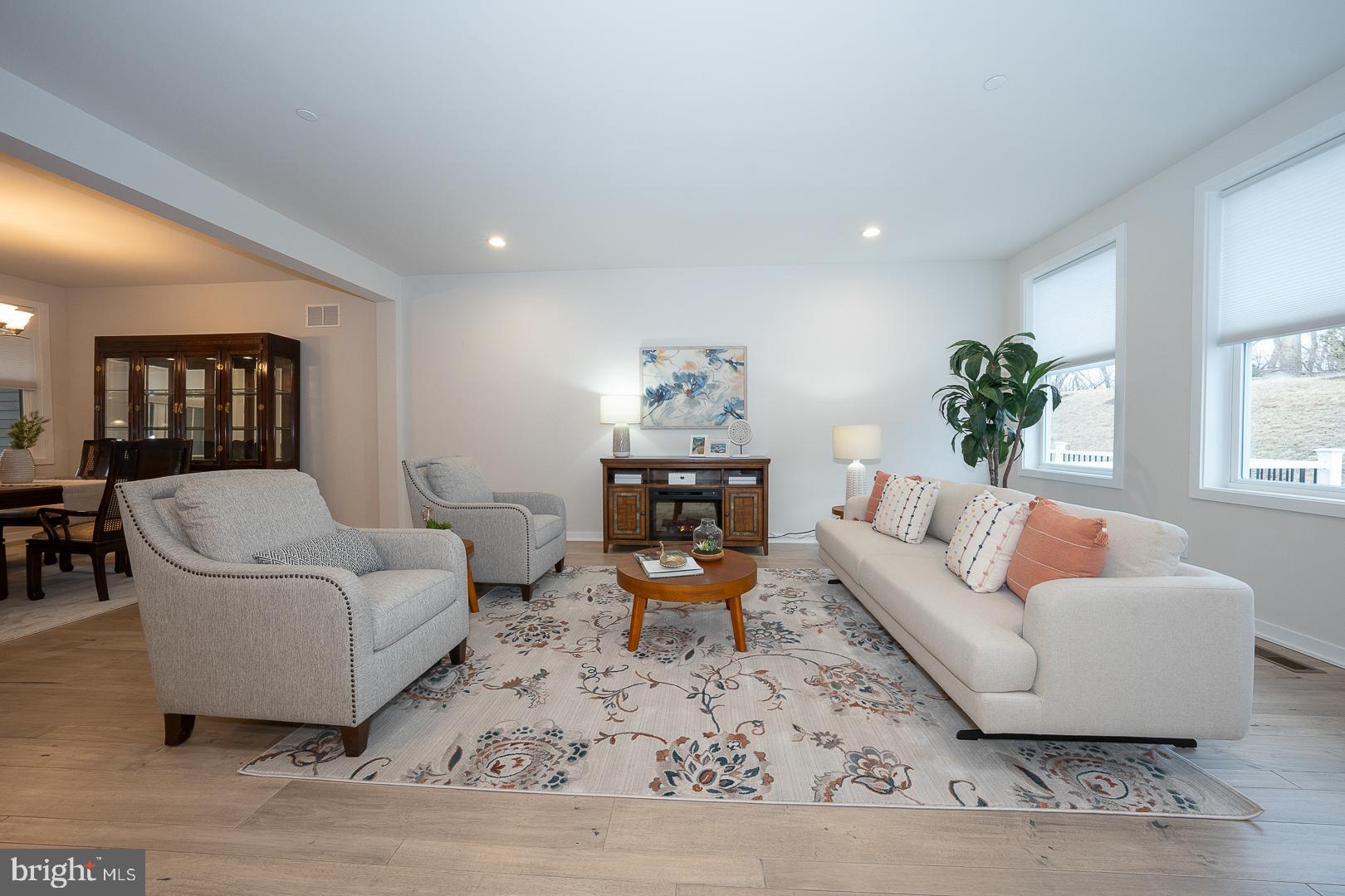 724 Switchman Road Media, PA 19063 - Photo 13 of 70 a living room with furniture and a wooden floor