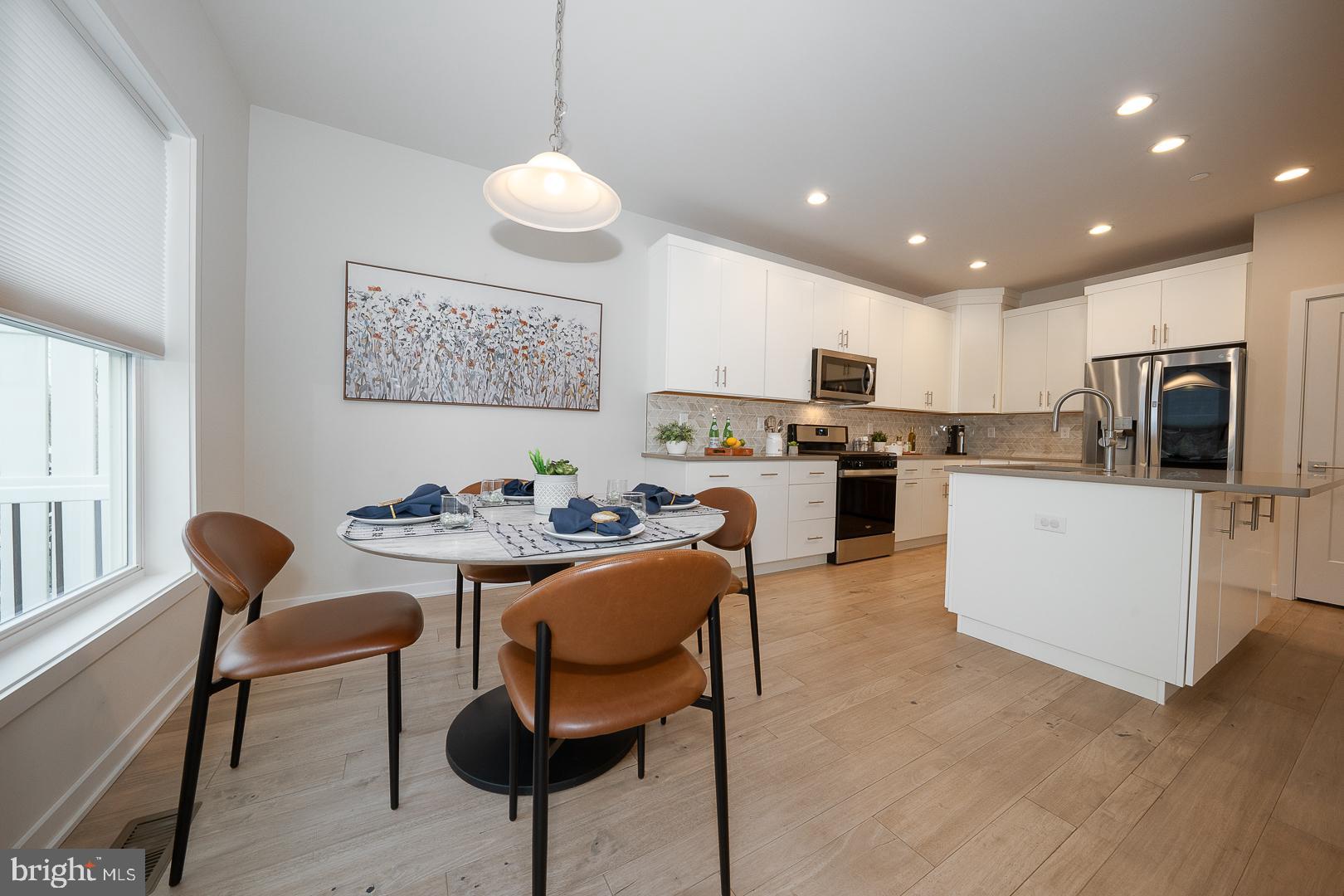 724 Switchman Road Media, PA 19063 - Photo 16 of 70 a view of kitchen with cabinets stainless steel appliances and dining table