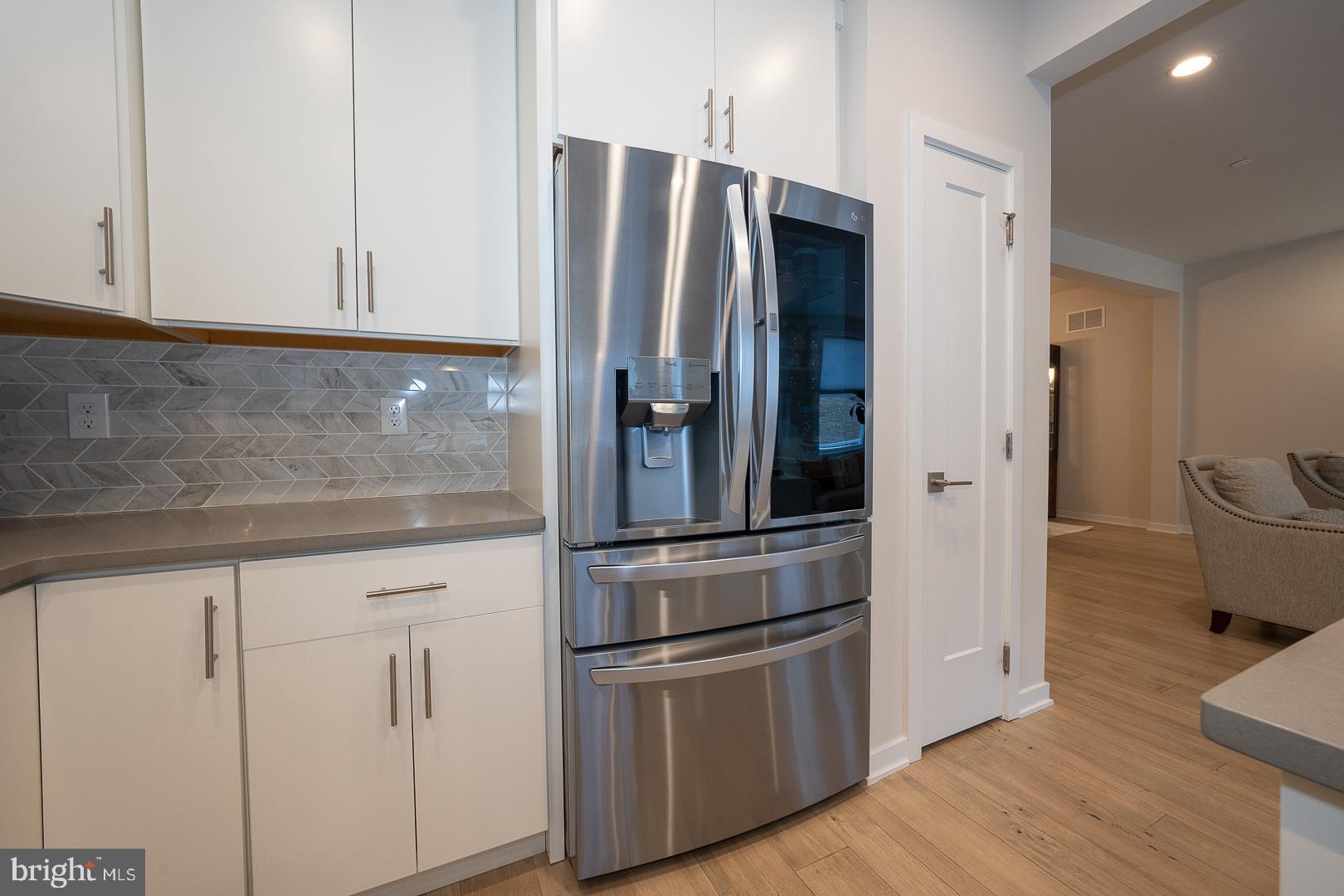 724 Switchman Road Media, PA 19063 - Photo 23 of 70 a metallic refrigerator freezer sitting in a kitchen
