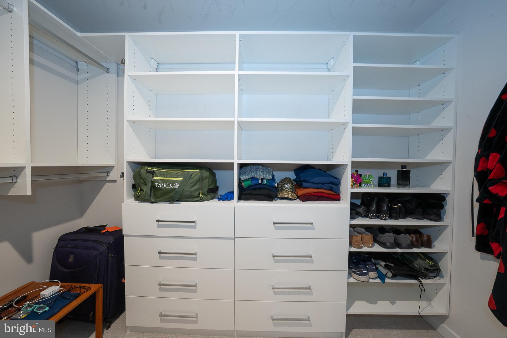 724 Switchman Road Media, PA 19063 - Photo 38 of 70 a view of walk in closet with clothes and shoes