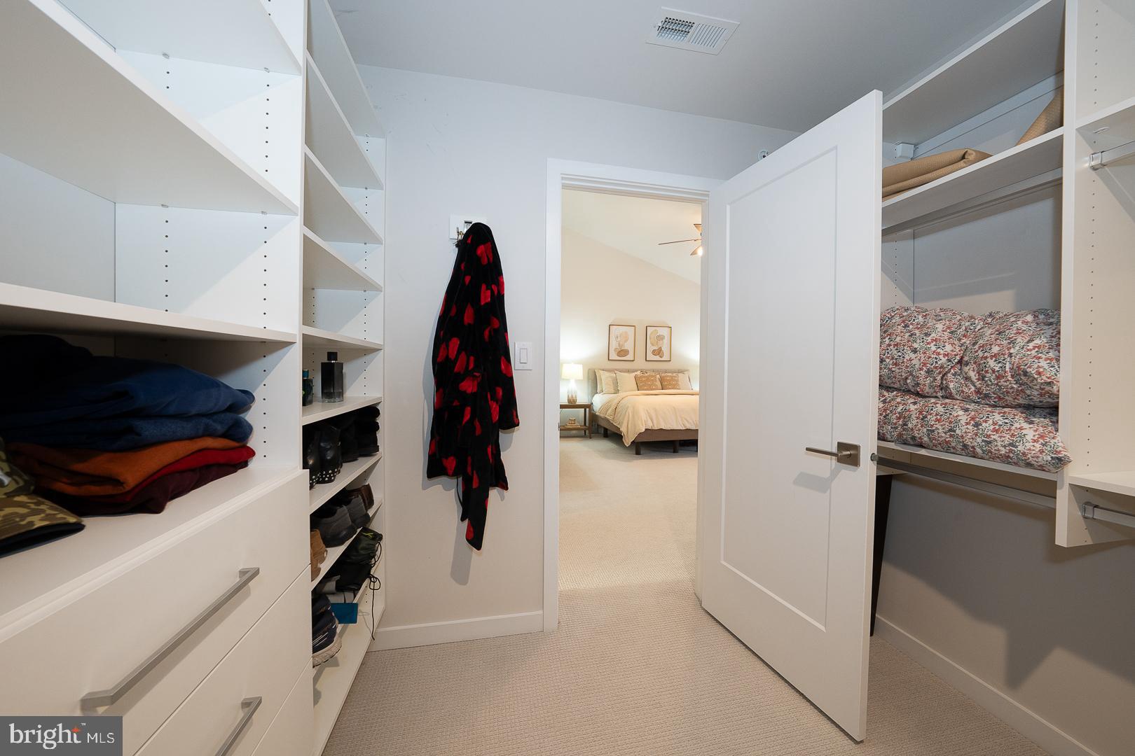 724 Switchman Road Media, PA 19063 - Photo 39 of 70 a view of walk in closet with clothes and shoes