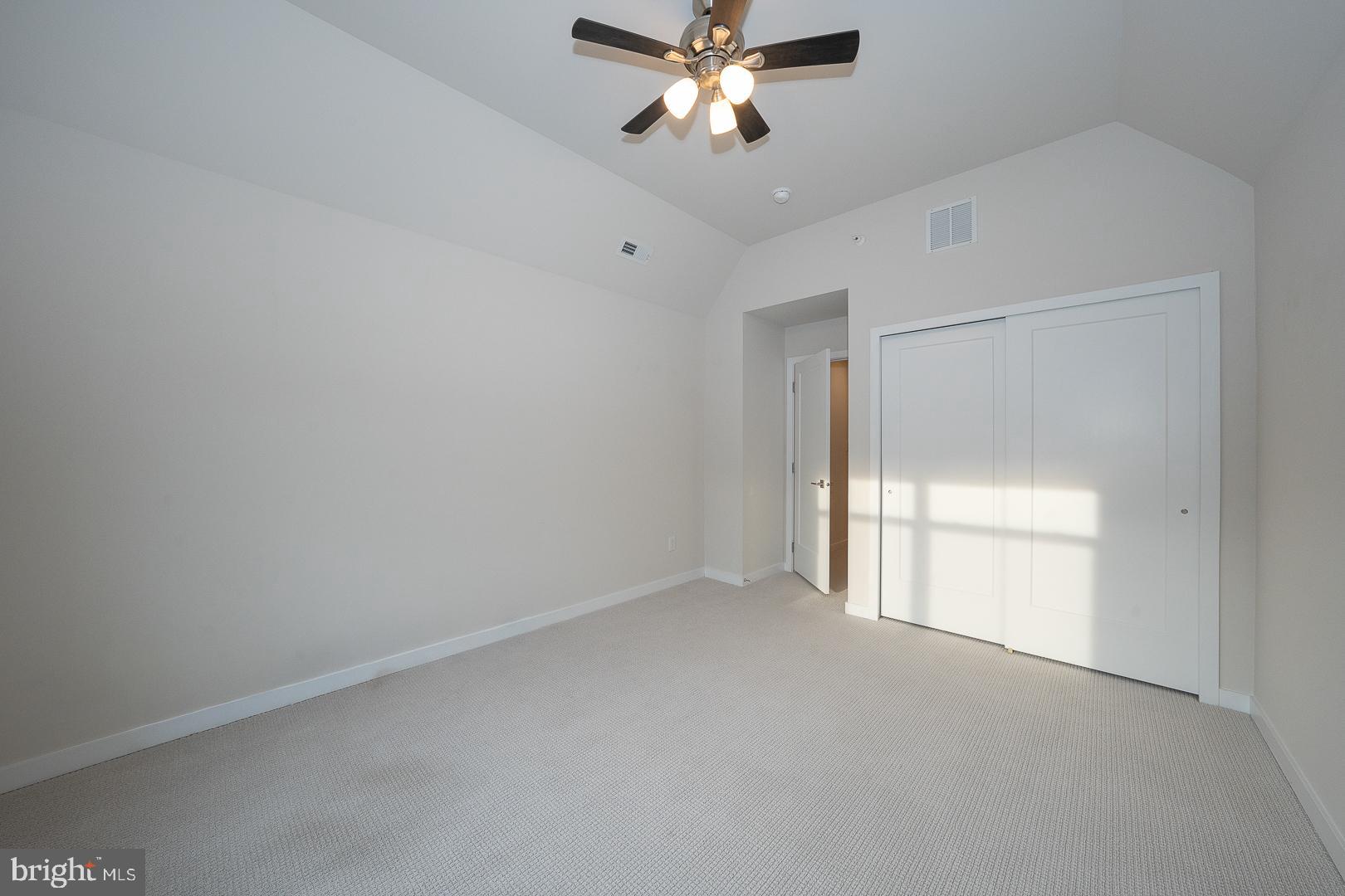 724 Switchman Road Media, PA 19063 - Photo 45 of 70 a view of an empty room and chandelier fan