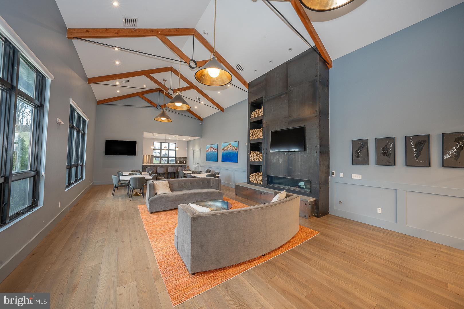 724 Switchman Road Media, PA 19063 - Photo 60 of 70 a living room with fireplace furniture and a flat screen tv