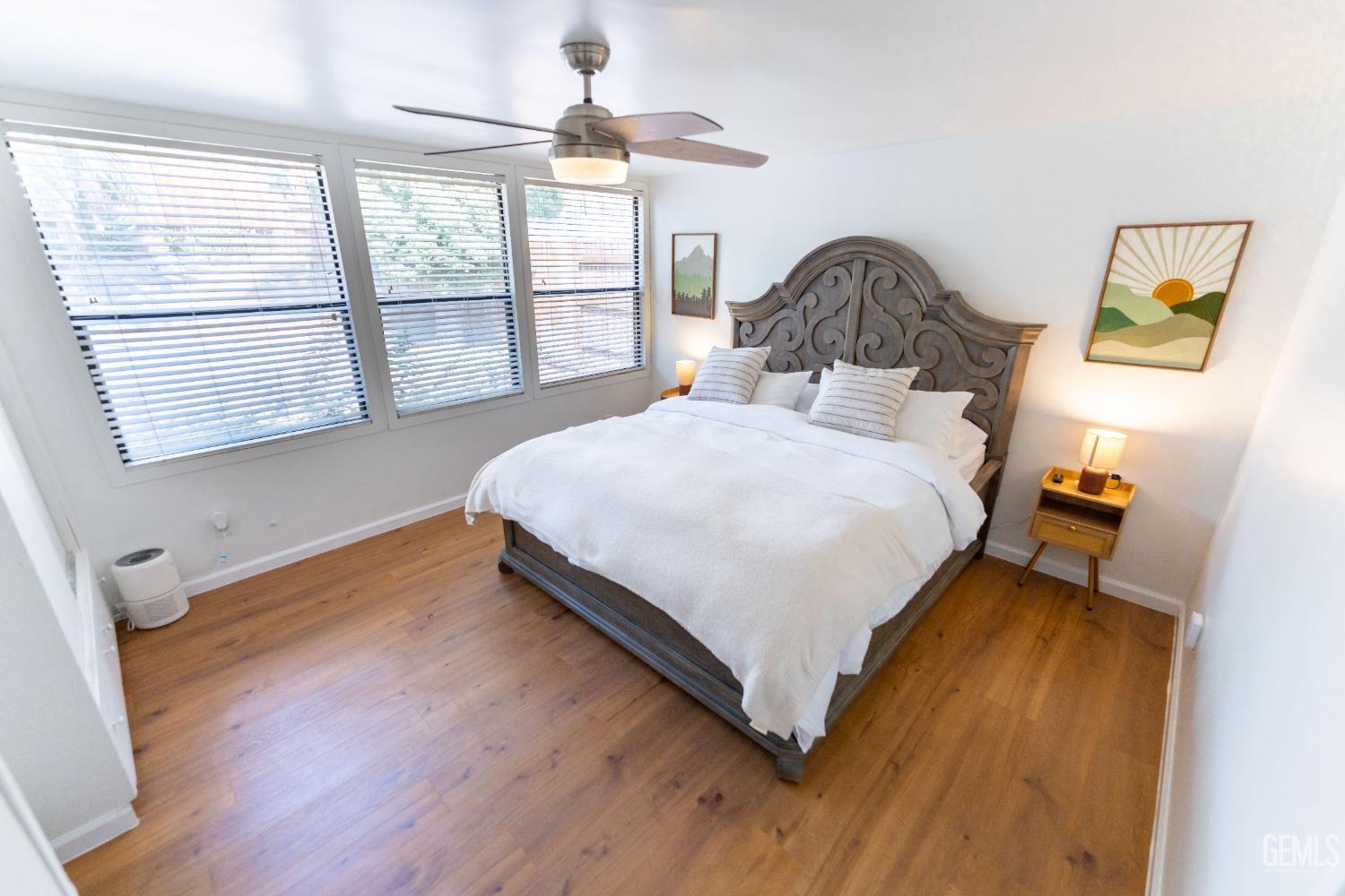 Undisclosed Address Bakersfield, CA 93306 - Photo 11 of 20 a bedroom with a bed and window