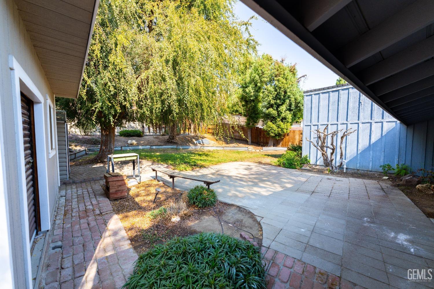 Undisclosed Address Bakersfield, CA 93306 - Photo 17 of 20 a view of a backyard with fountain